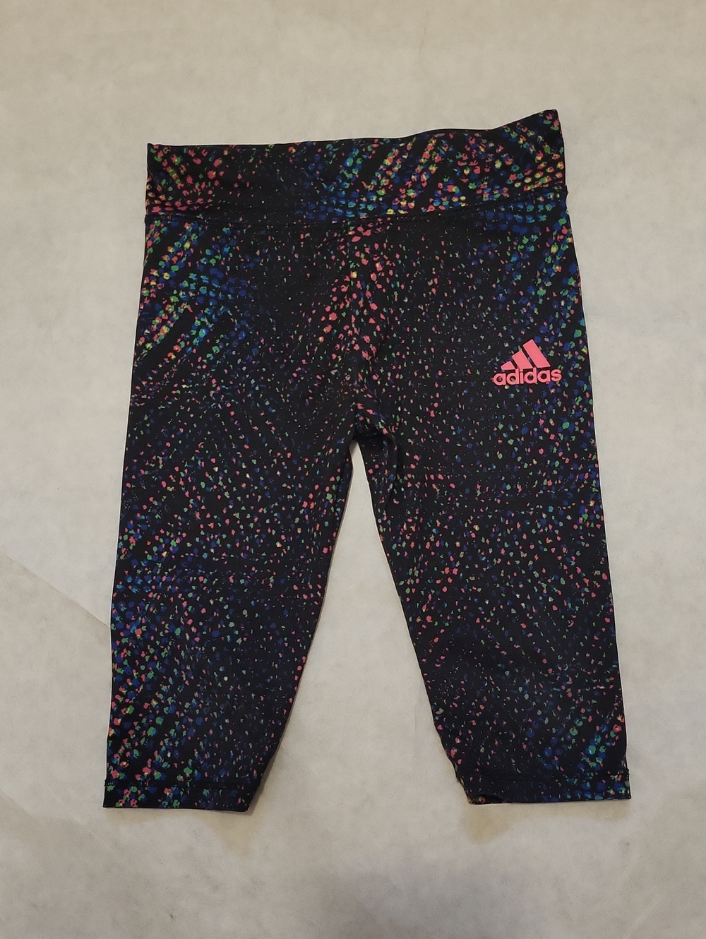 Adidas black capri tights with multicolor speckle and pink logo